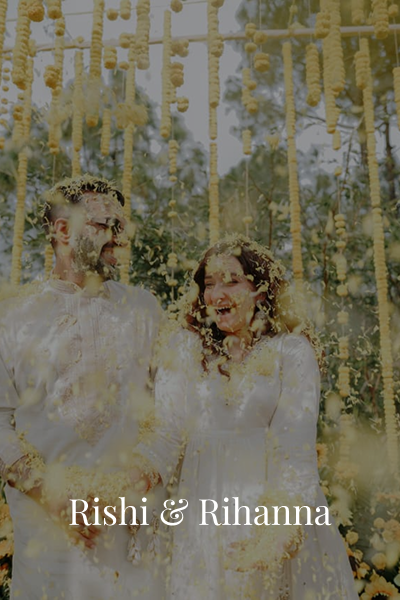 Rishi & Rihanna candid wedding portrait with floral decor | KartikClicks