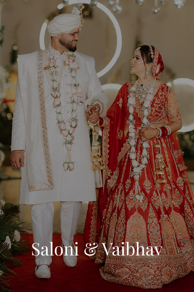 Bride and groom in traditional Indian wedding attire. | KartikClicks
